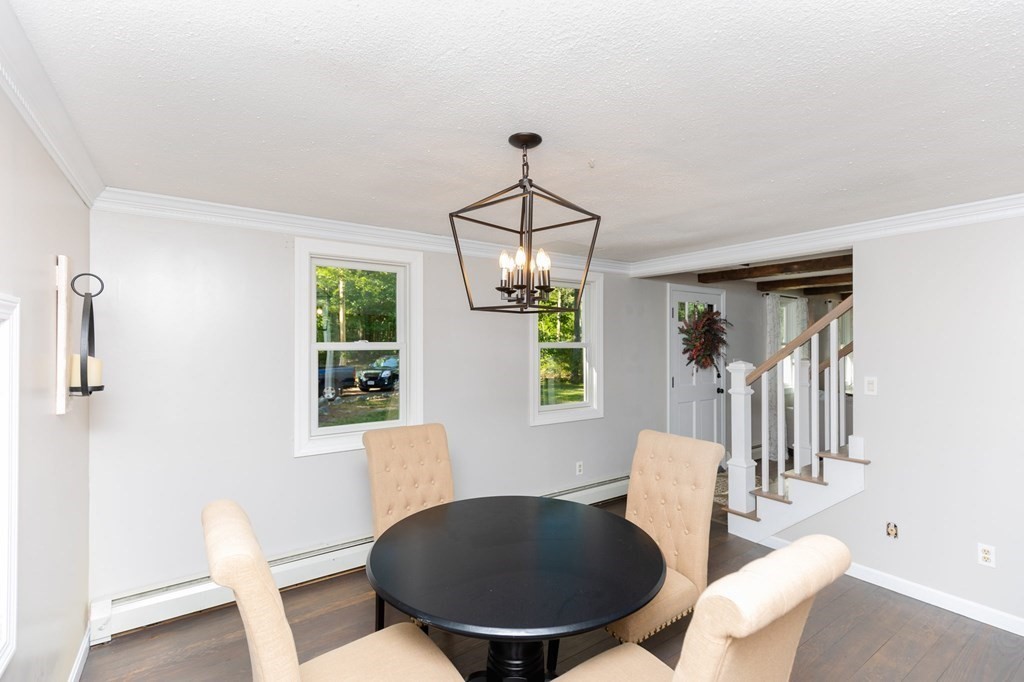 236 High Street Rochester, MA 02770 - Photo 5 of 35 a dining room with furniture a chandelier and window