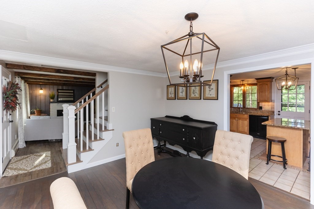 236 High Street Rochester, MA 02770 - Photo 6 of 35 a living room with furniture and a chandelier