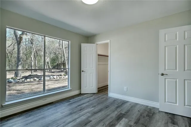 a view of an empty room with window