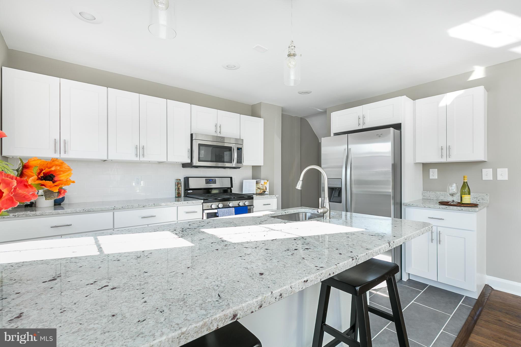 8429 Greenway Road Baltimore, MD 21286 - Photo 13 of 30 Kitchen with Huge Breakfast Bar