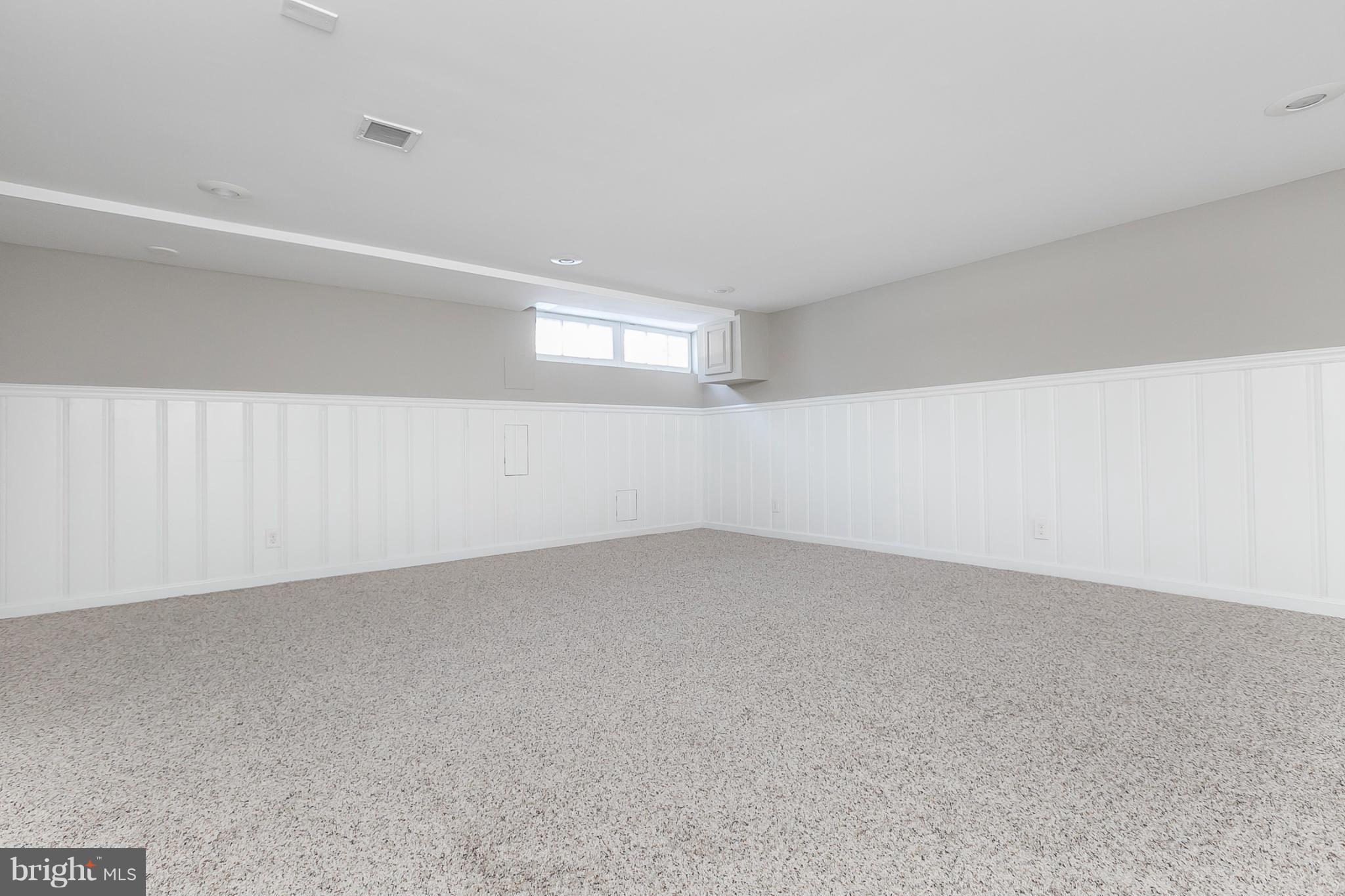 8429 Greenway Road Baltimore, MD 21286 - Photo 25 of 30 Finished Basement with Wainscoting