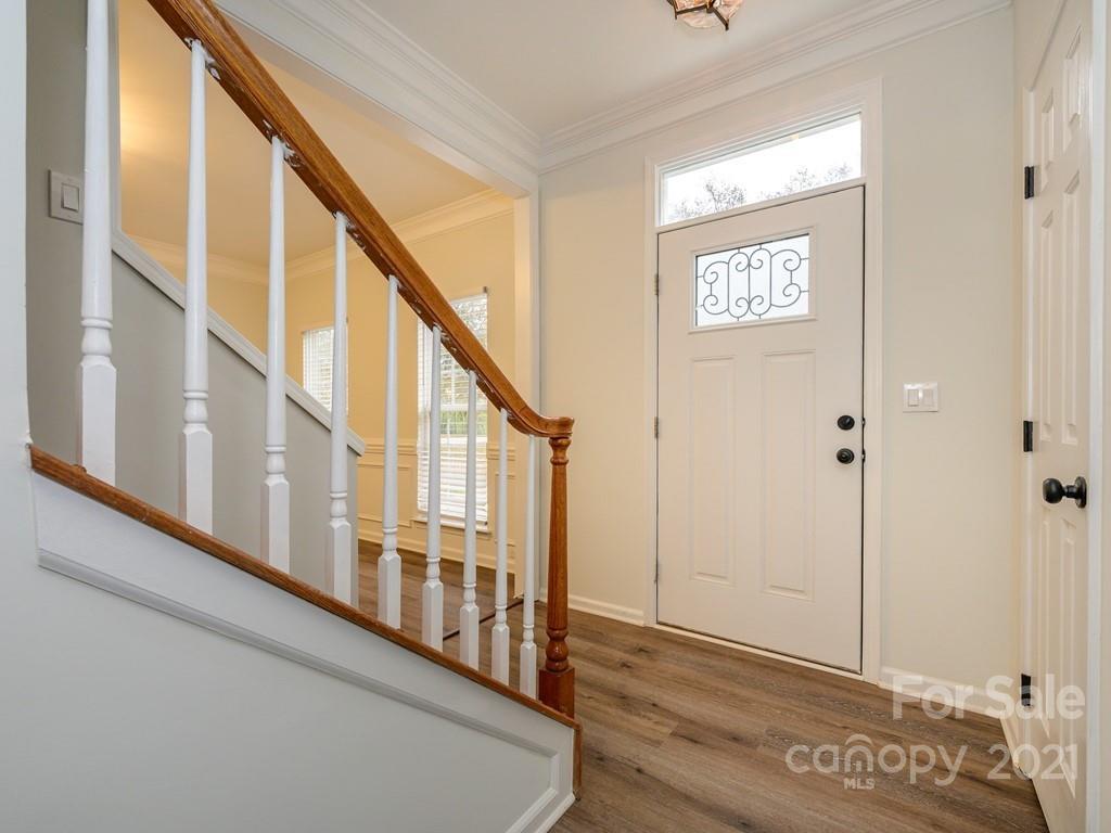 1446 Autumn Ridge Lane Fort Mill, SC 29708 - Photo 3 of 35 a view of an entryway with wooden floor