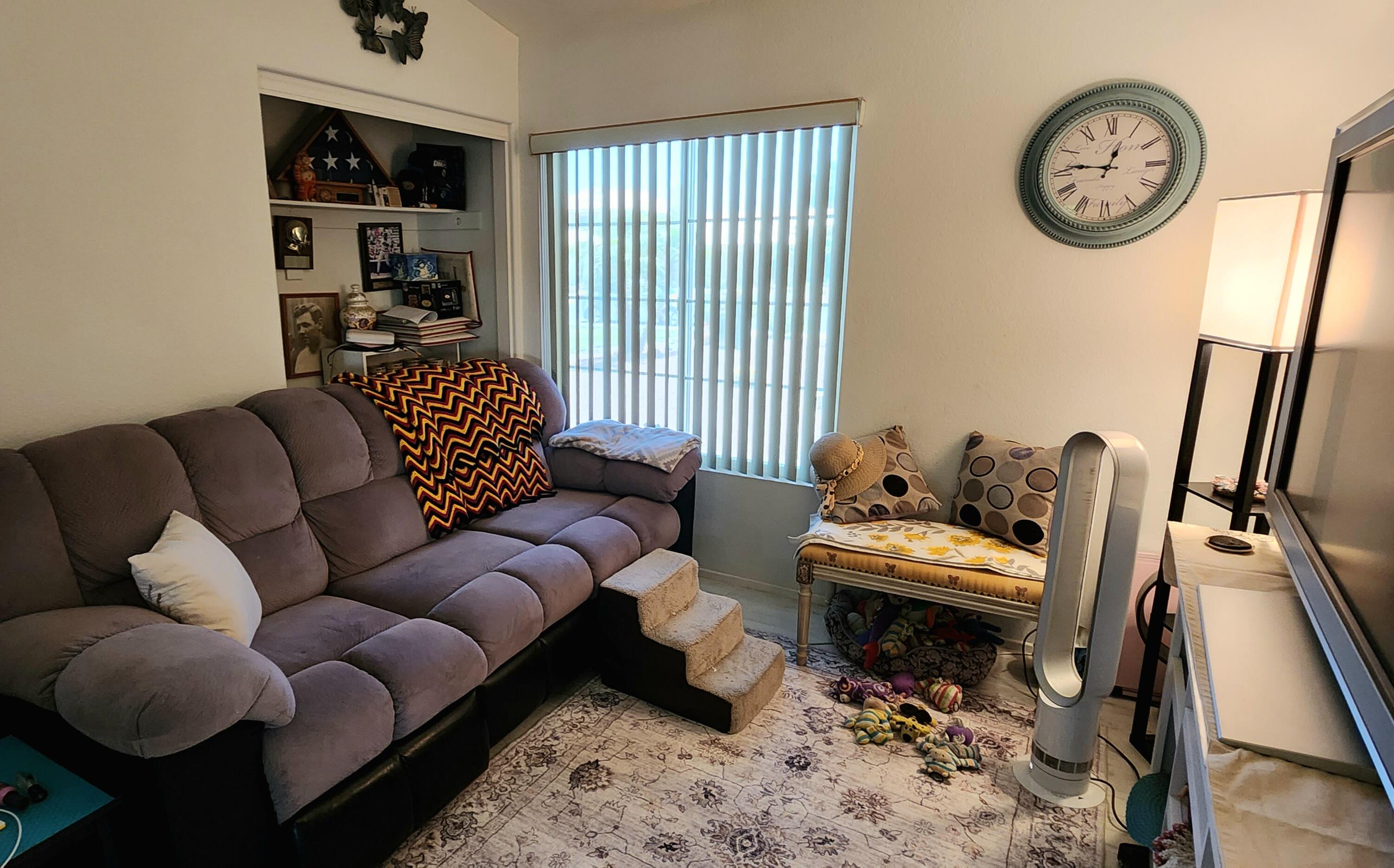 78820 Irwin Circle La Quinta, CA 92253 - Photo 10 of 12 a living room with furniture or couch and a large window