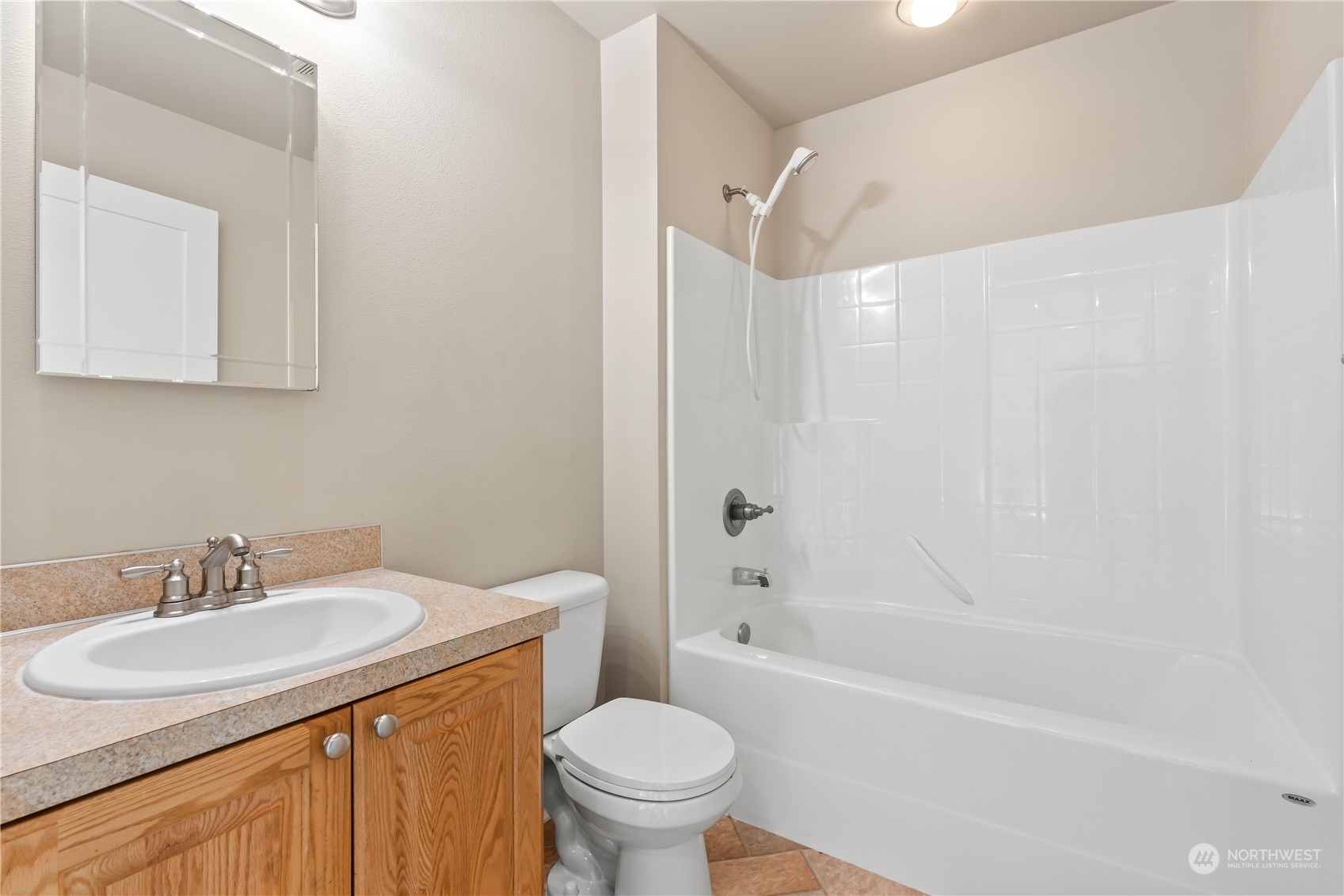 1189 Spiketon Road Buckley, WA 98321 - Photo 19 of 31 a bathroom with a sink toilet and shower