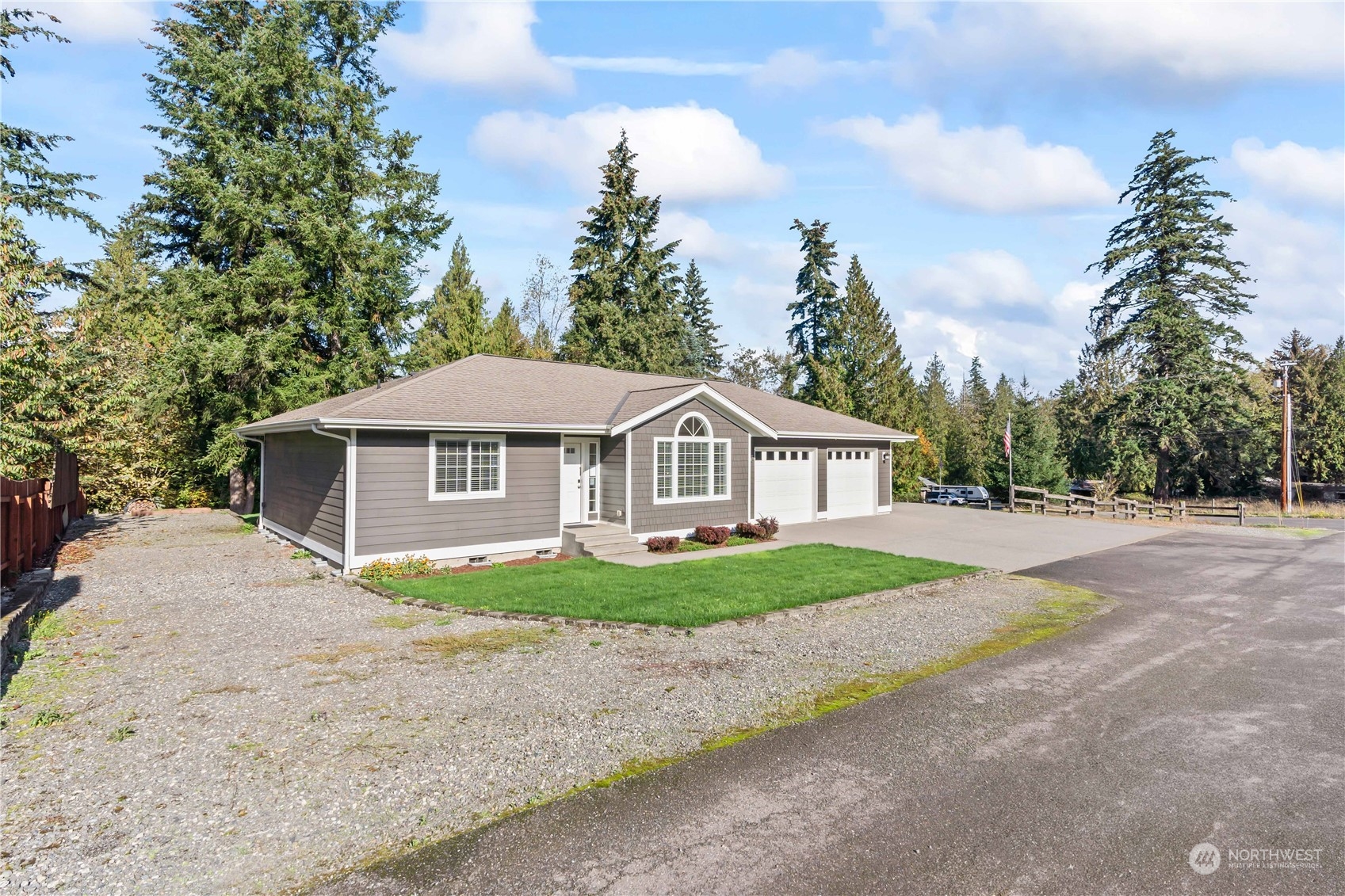 1189 Spiketon Road Buckley, WA 98321 - Photo 5 of 31 a front view of a house with a garden