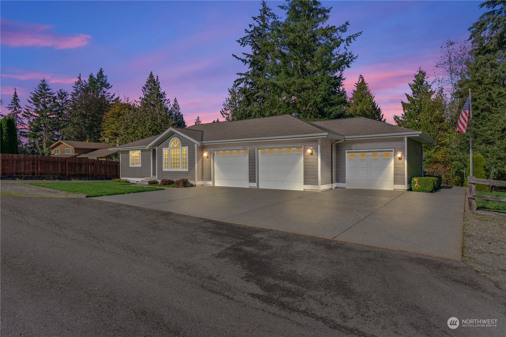 1189 Spiketon Road Buckley, WA 98321 - Photo 6 of 31 a front view of a house with a yard and garage