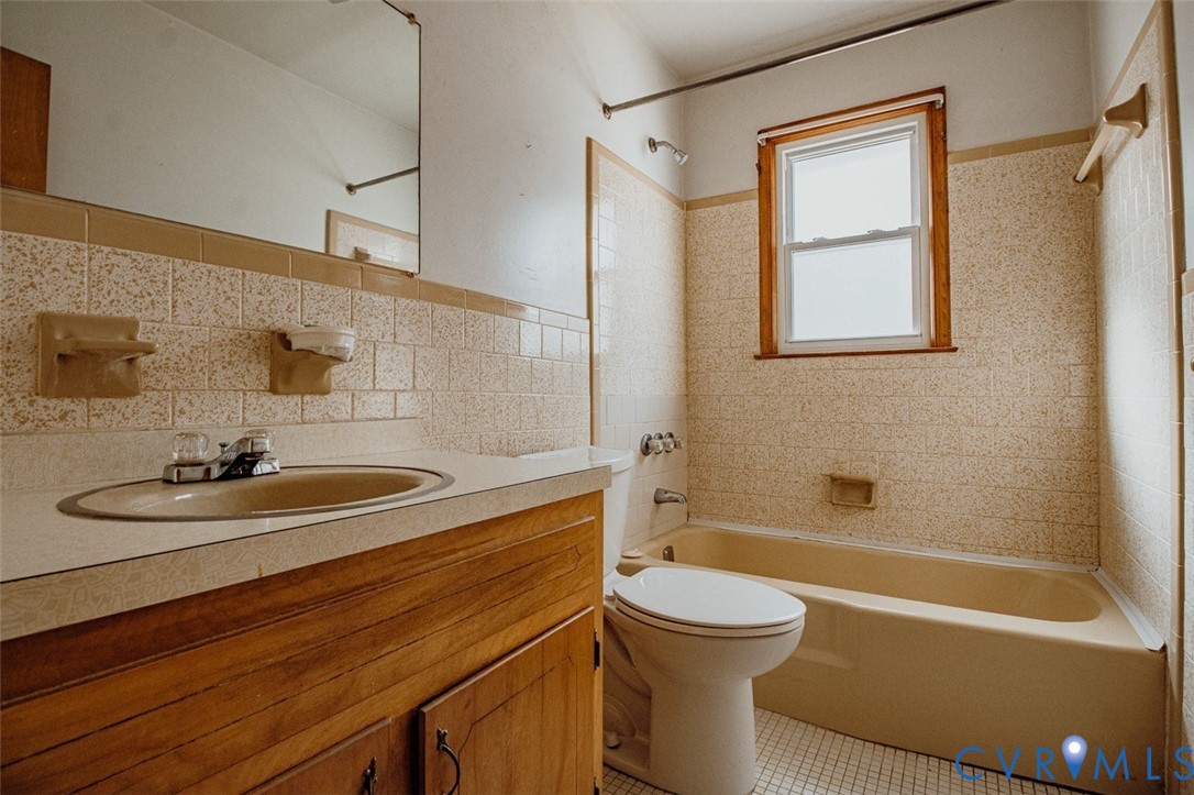 6710 Heritage Road Prince George, VA 23875 - Photo 15 of 27 a bathroom with a sink a toilet and shower