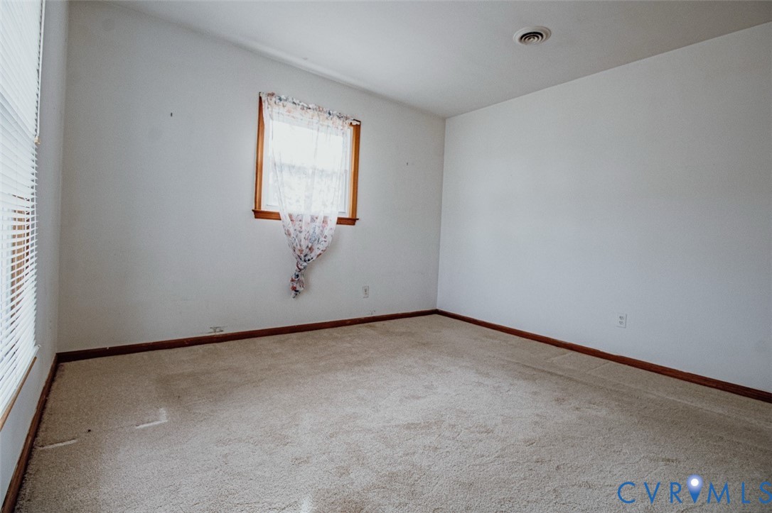 6710 Heritage Road Prince George, VA 23875 - Photo 20 of 27 a view of an empty room with a window
