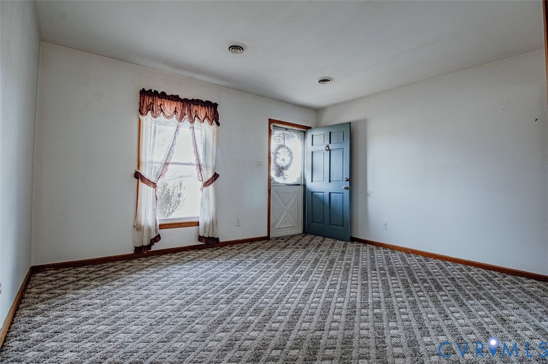 6710 Heritage Road Prince George, VA 23875 - Photo 5 of 27 a view of an empty room and window