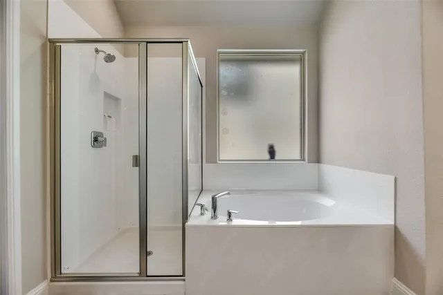 a backyard of a house with outdoor seating