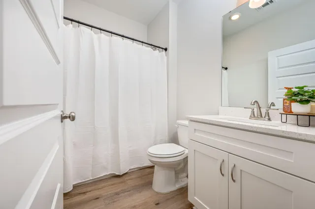 a room with a table and chairs