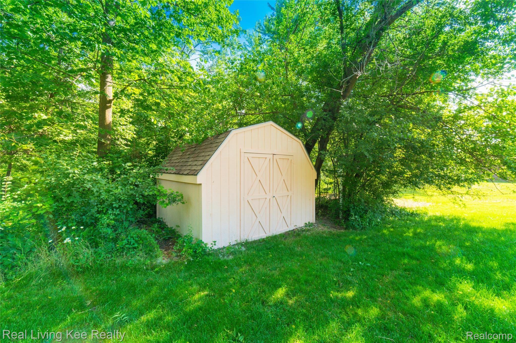 1242 Ruby Avenue Rochester, MI 48309 - Photo 29 of 35 Freshly painted shed
