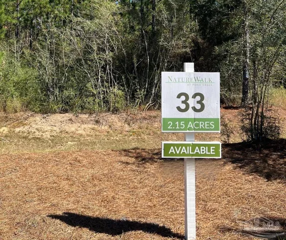 a sign on the side of a road