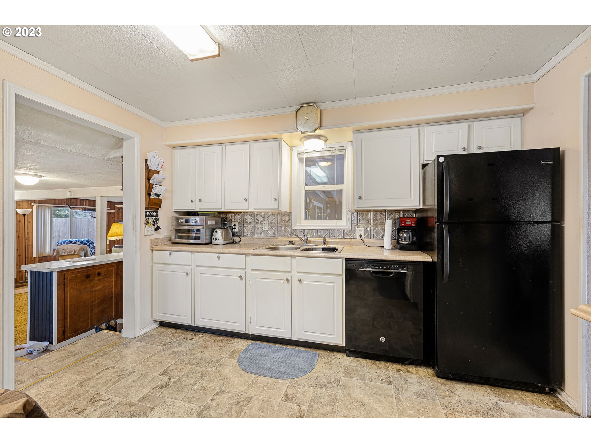 2500 J Street Springfield, OR 97477 - Photo 12 of 27 a kitchen with a refrigerator and a stove