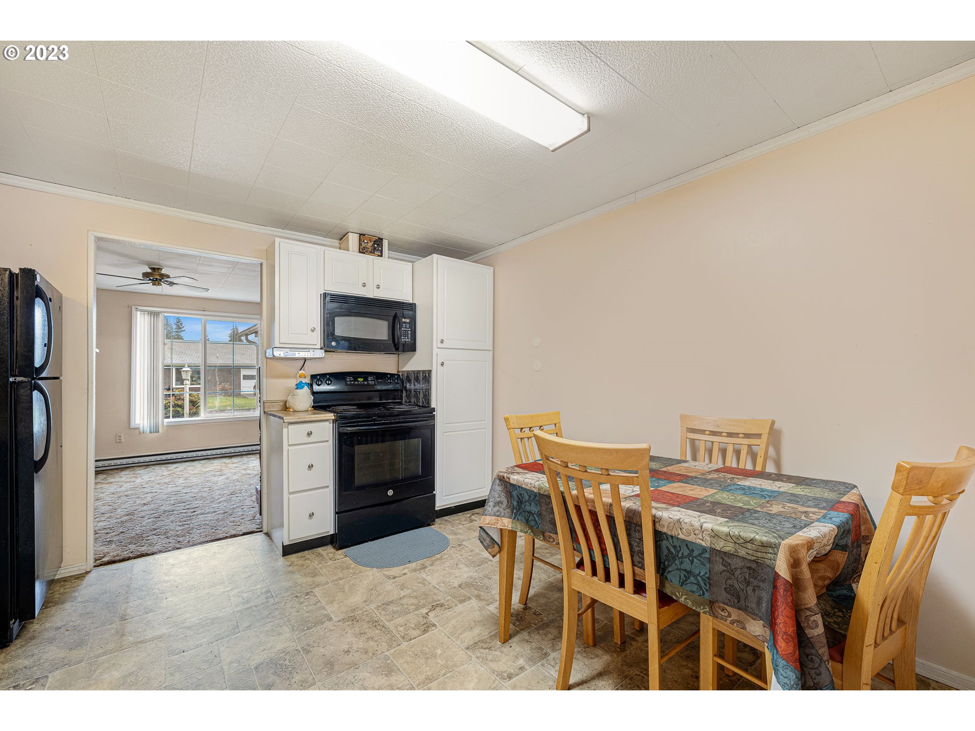 2500 J Street Springfield, OR 97477 - Photo 13 of 27 a kitchen with a table and chairs