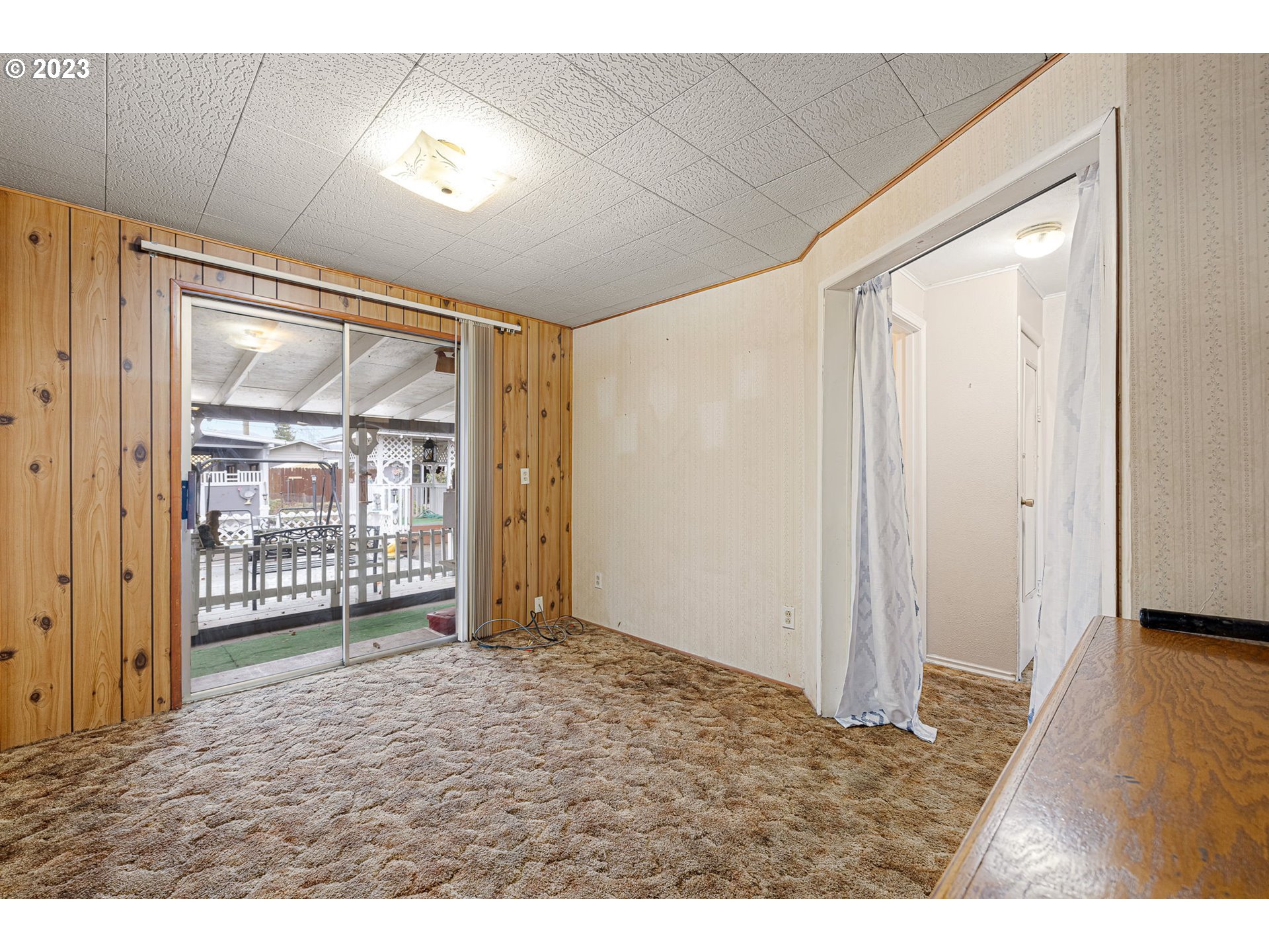 2500 J Street Springfield, OR 97477 - Photo 19 of 27 a view of an empty room with glass door