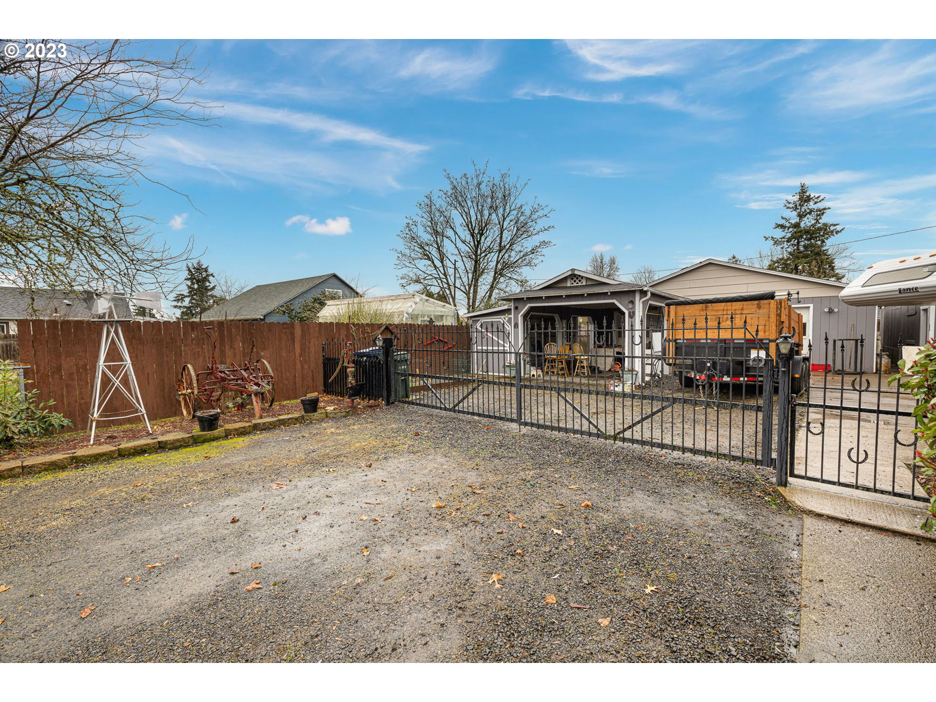 2500 J Street Springfield, OR 97477 - Photo 24 of 27 a view of a house with wooden fence