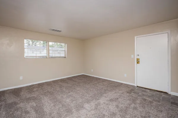 an empty room with windows