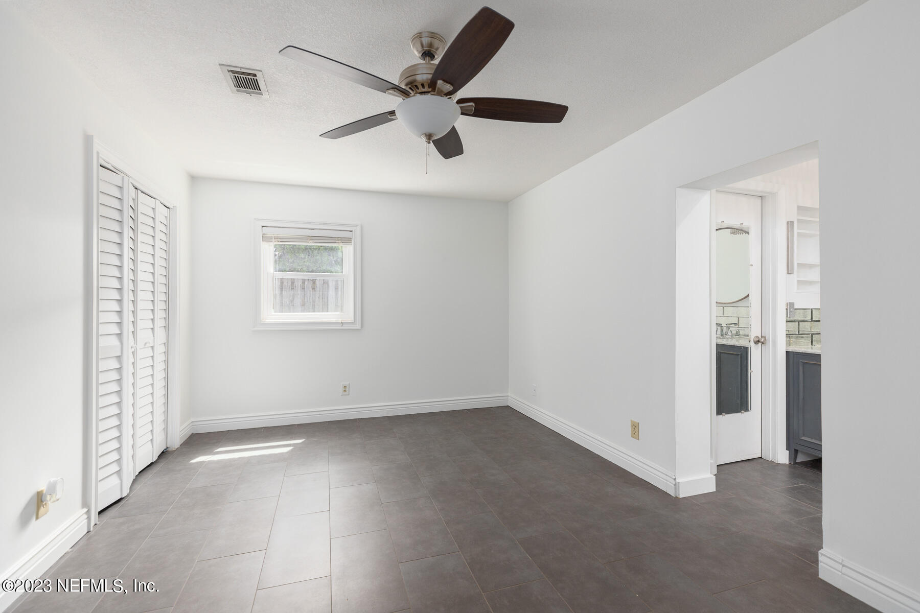 9 Amberjack Road Ponte Vedra Beach, FL 32082 - Photo 18 of 30 a view of an empty room with a window