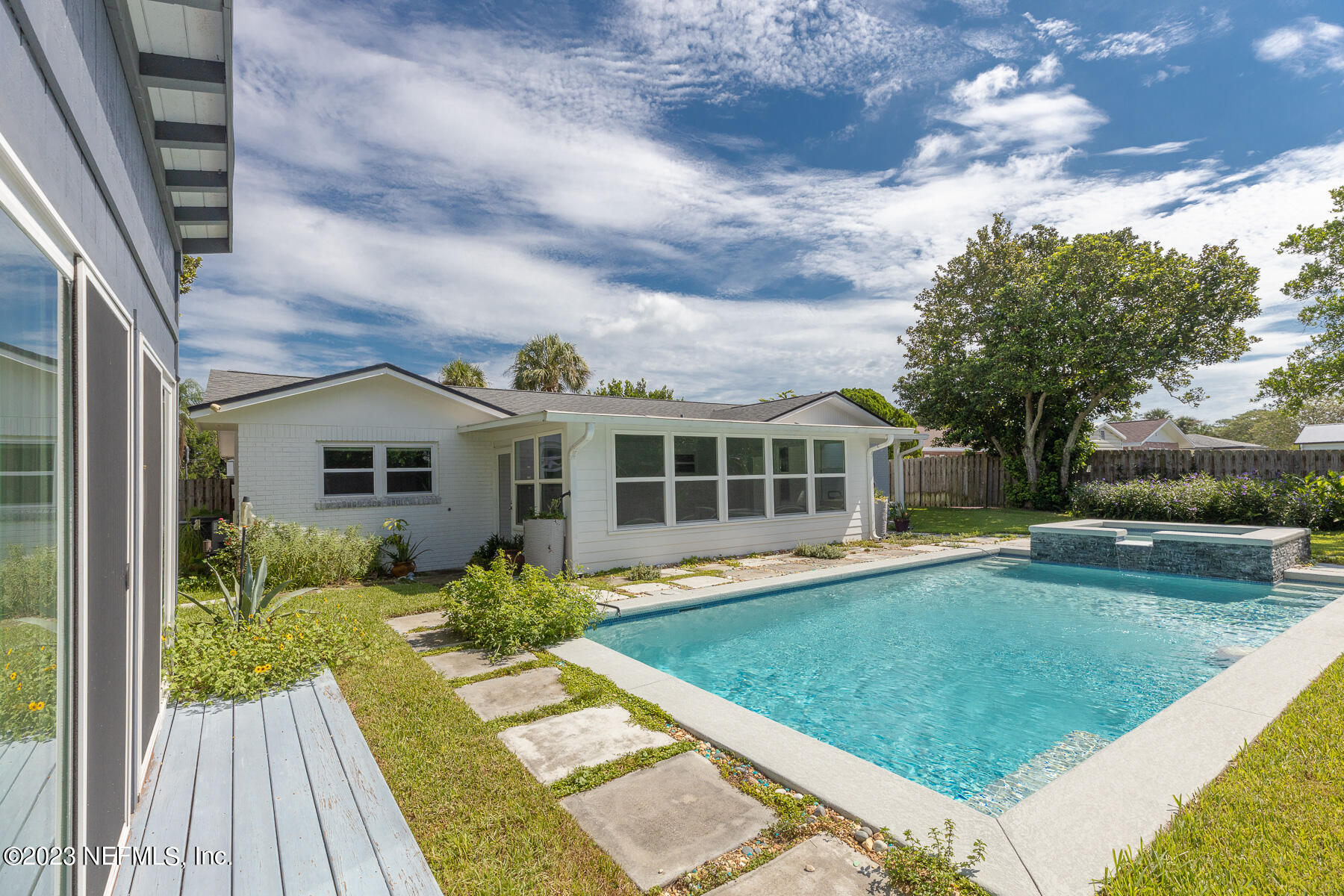 9 Amberjack Road Ponte Vedra Beach, FL 32082 - Photo 29 of 30 a view of house with swimming pool outdoor seating