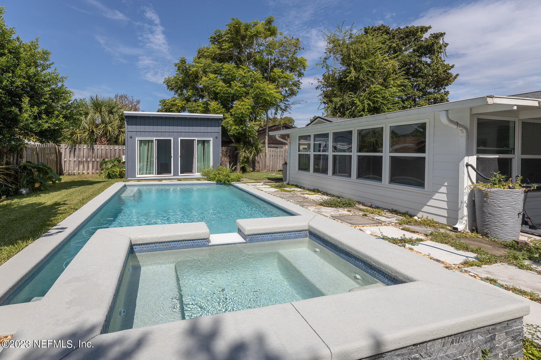 9 Amberjack Road Ponte Vedra Beach, FL 32082 - Photo 30 of 30 a view of a house with pool fire pit couches and a patio