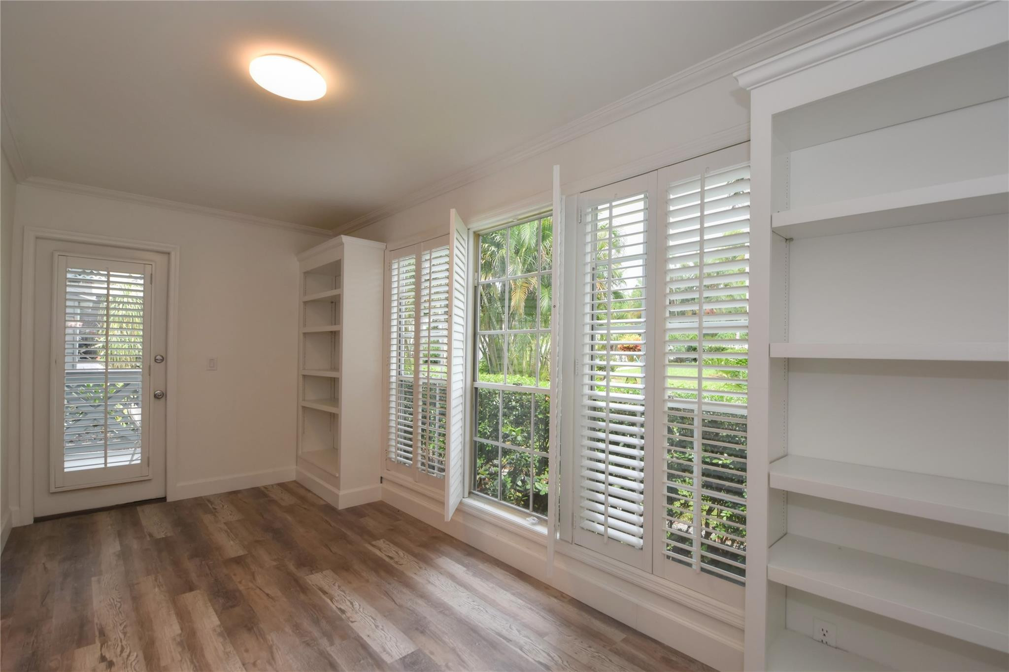 5064 Heatherhill Lane, Unit 7 Boca Raton, FL 33486 - Photo 13 of 33 Patio access from Sun Room