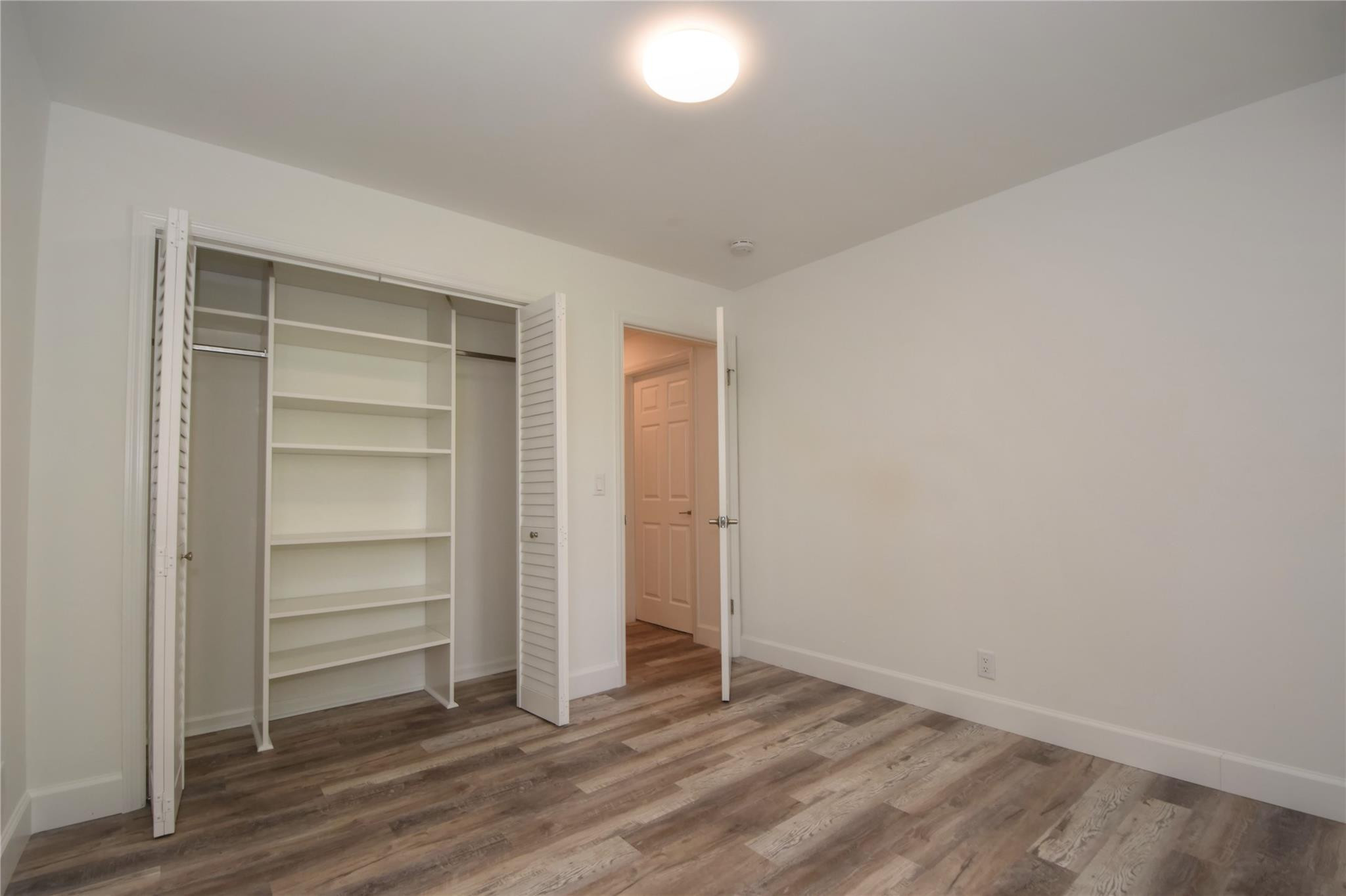 5064 Heatherhill Lane, Unit 7 Boca Raton, FL 33486 - Photo 22 of 33 Nice 2nd bedroom with closet builtins