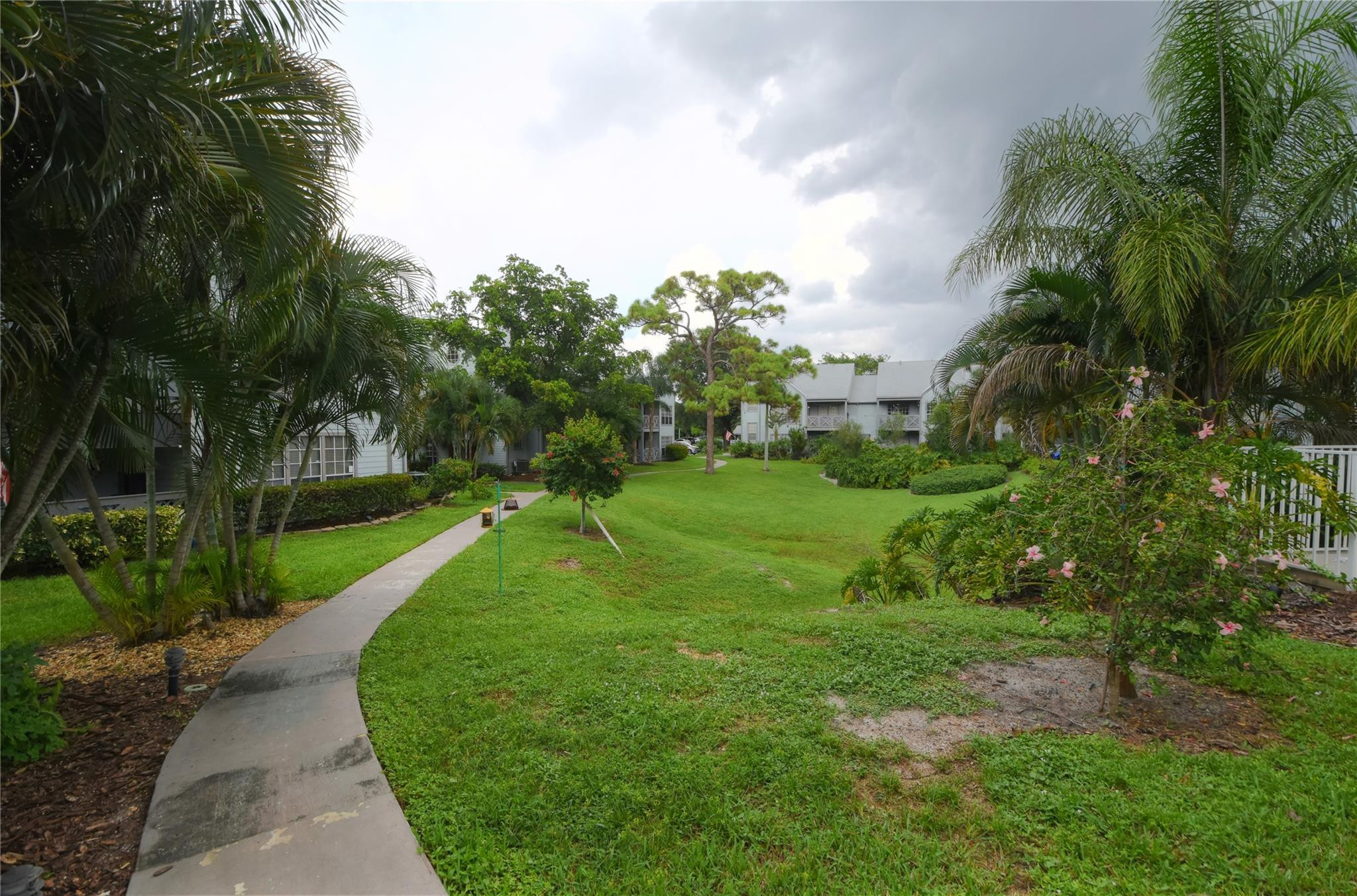 5064 Heatherhill Lane, Unit 7 Boca Raton, FL 33486 - Photo 30 of 33 Open greenbelts with mature trees