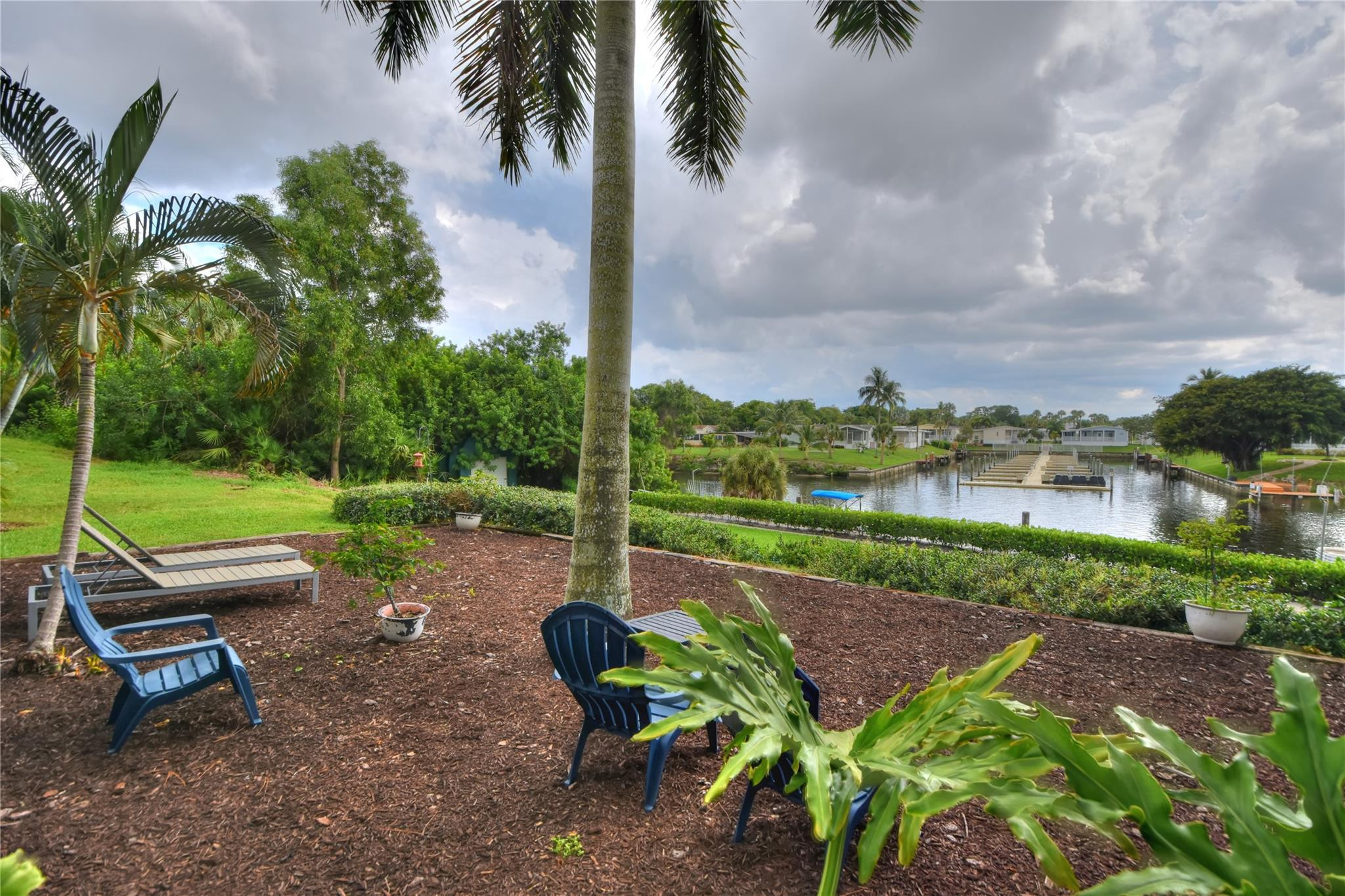 5064 Heatherhill Lane, Unit 7 Boca Raton, FL 33486 - Photo 3 of 33 Large gathering area on Canal