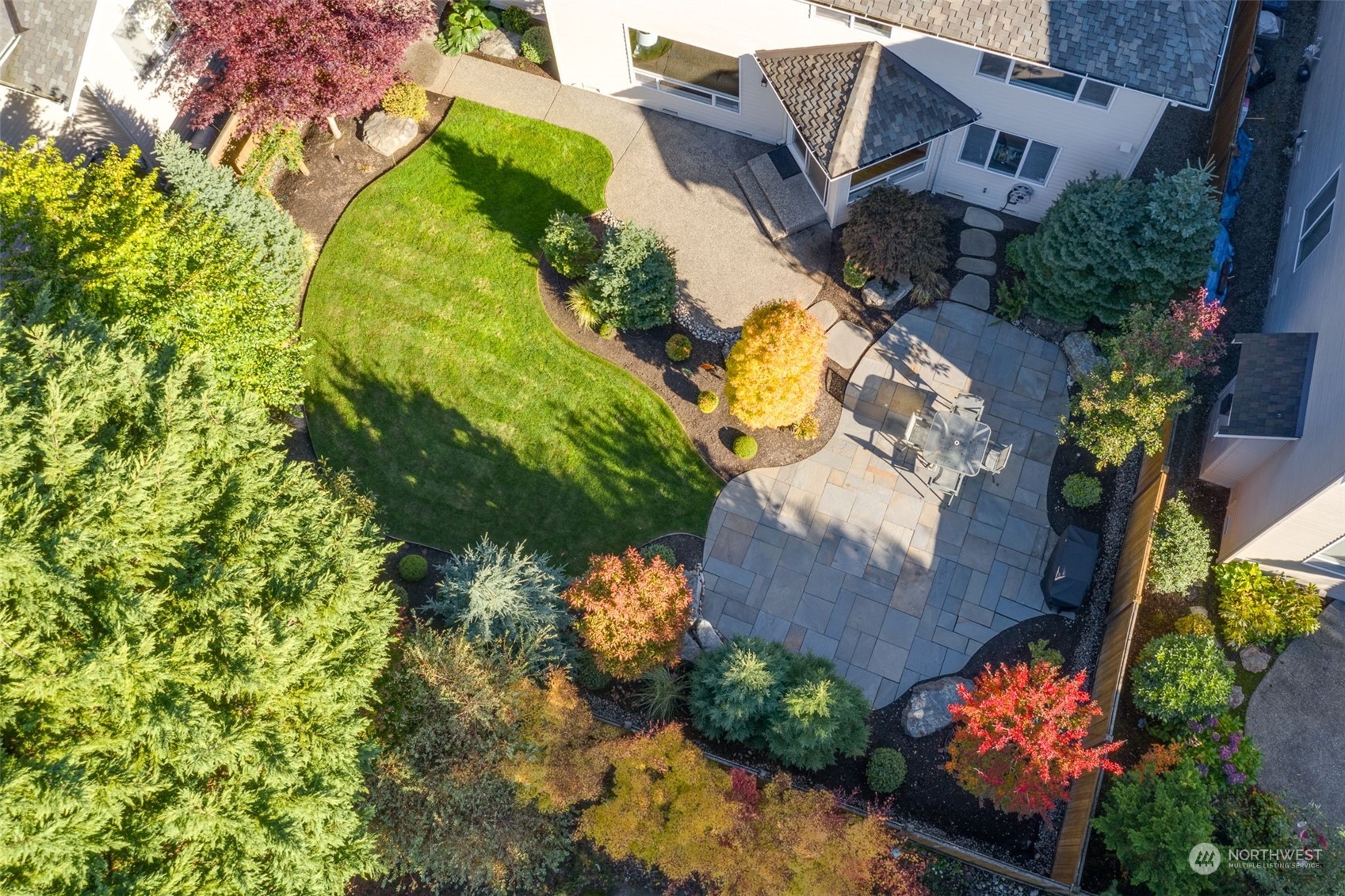 20022 27th Drive Southeast Bothell, WA 98012 - Photo 16 of 37 an aerial view of a house with a yard and garden