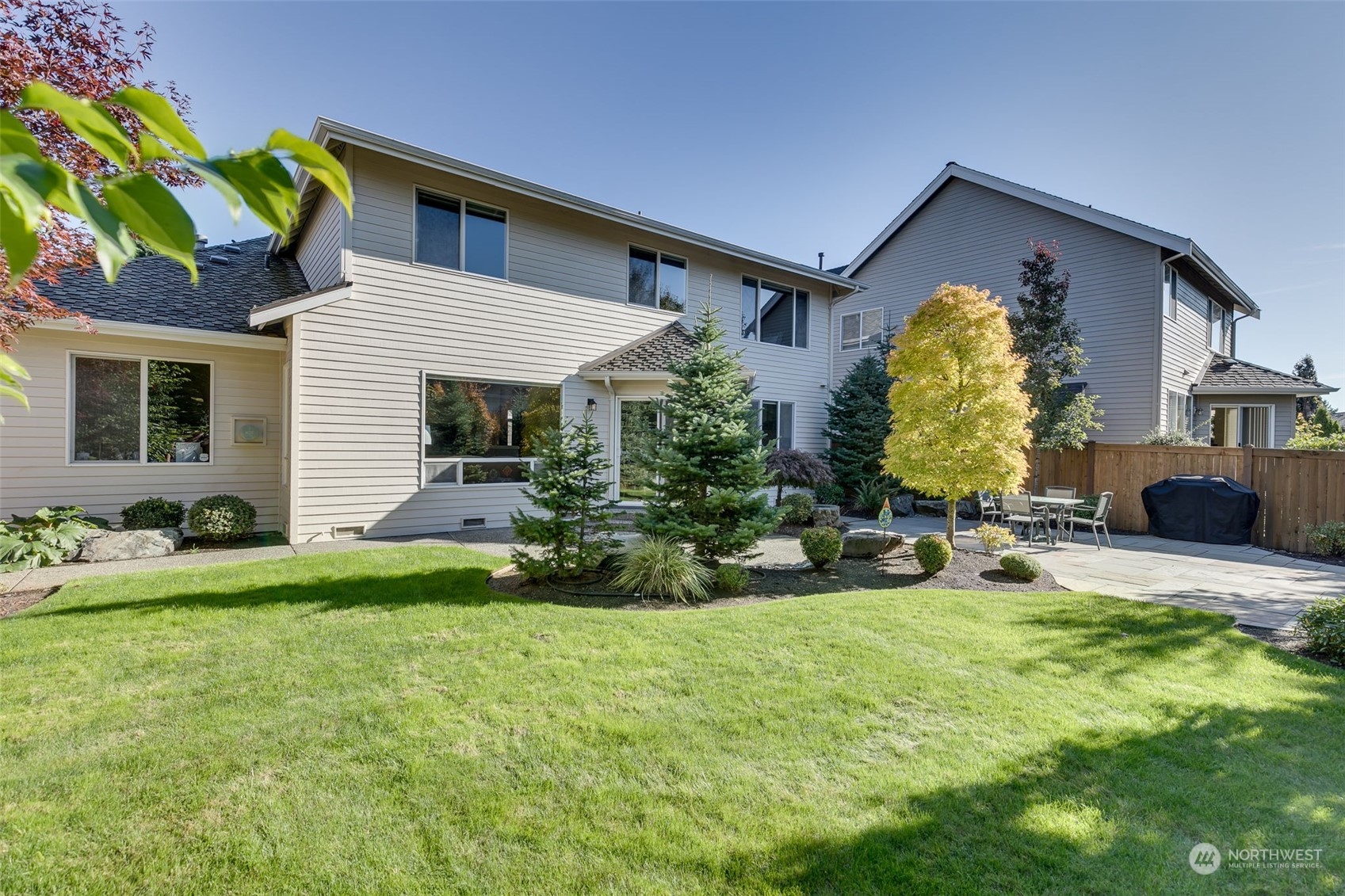 20022 27th Drive Southeast Bothell, WA 98012 - Photo 18 of 37 a view of house with backyard and sitting area