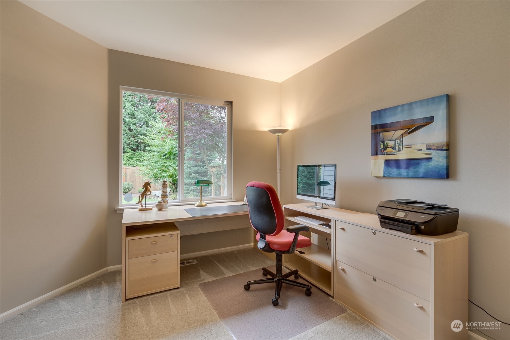 20022 27th Drive Southeast Bothell, WA 98012 - Photo 23 of 37 a view of a workspace with furniture and a window
