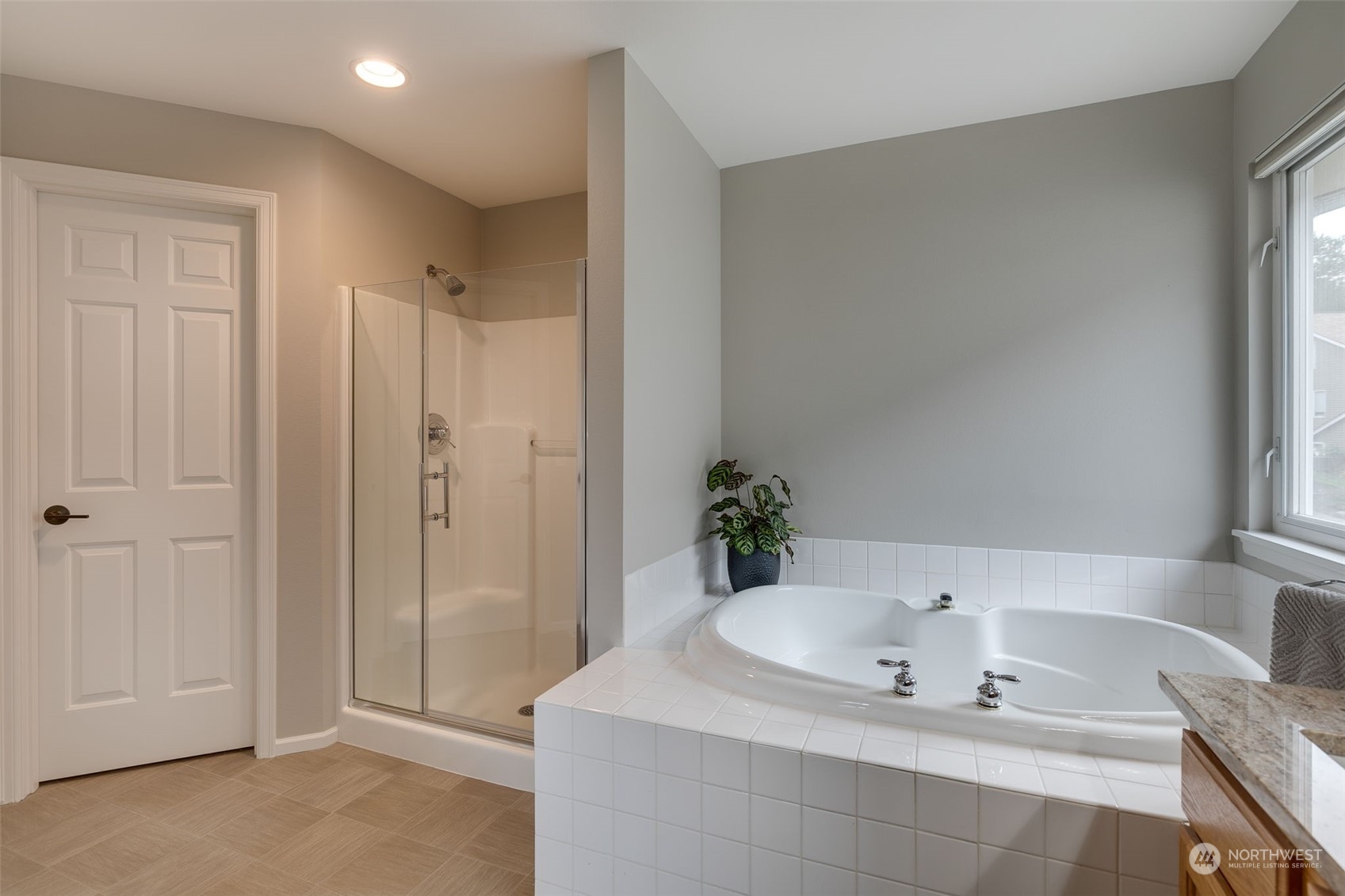 20022 27th Drive Southeast Bothell, WA 98012 - Photo 29 of 37 a bathroom with a bathtub and a sink