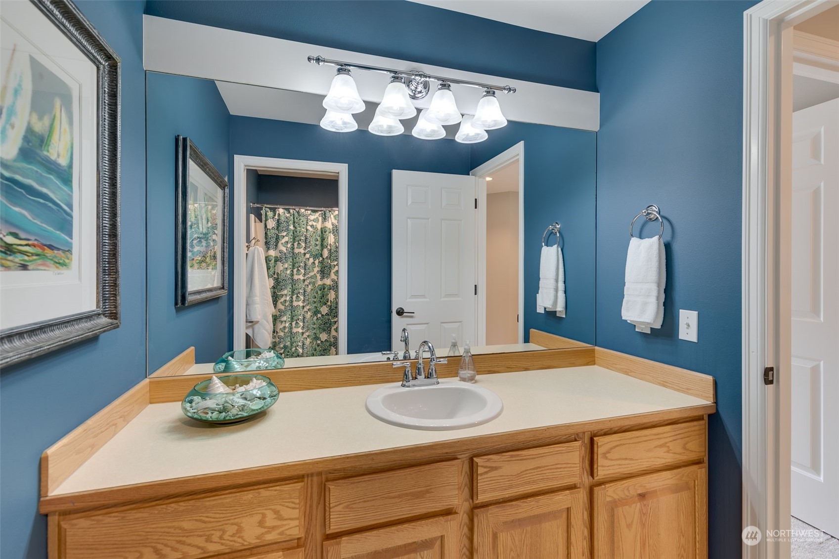 20022 27th Drive Southeast Bothell, WA 98012 - Photo 32 of 37 a bathroom with a sink and a mirror
