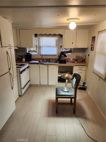 a kitchen with a workspace