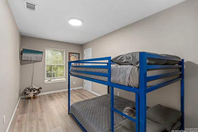 a bedroom with bunk bed