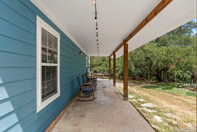 a view of a chairs and tables in the patio