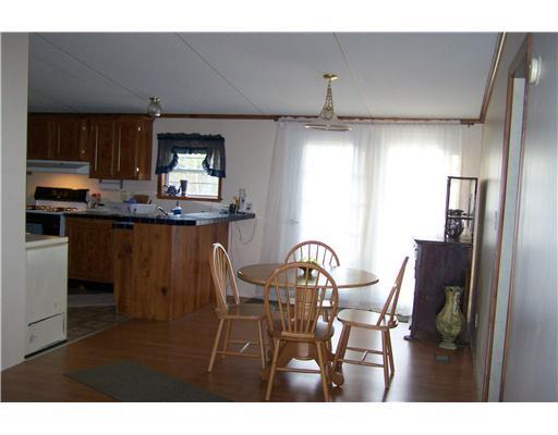 461 Canaan Road Pittsfield, ME 04967 - Photo 8 of 20 Dining Room. Sunny and bright dining...