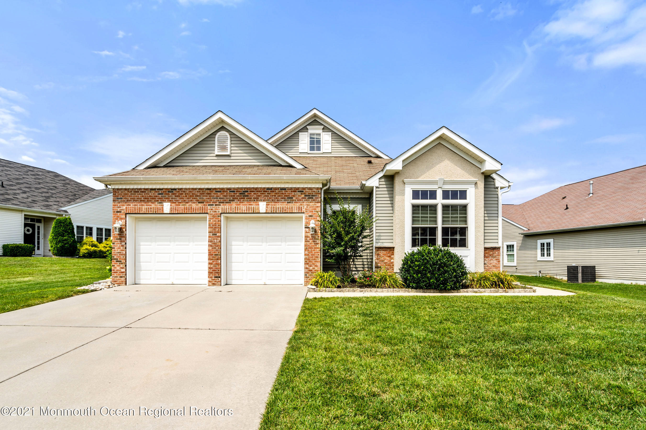 7 Millstone Way Waretown, NJ 08758 - Photo 1 of 45 a front view of a house with a yard