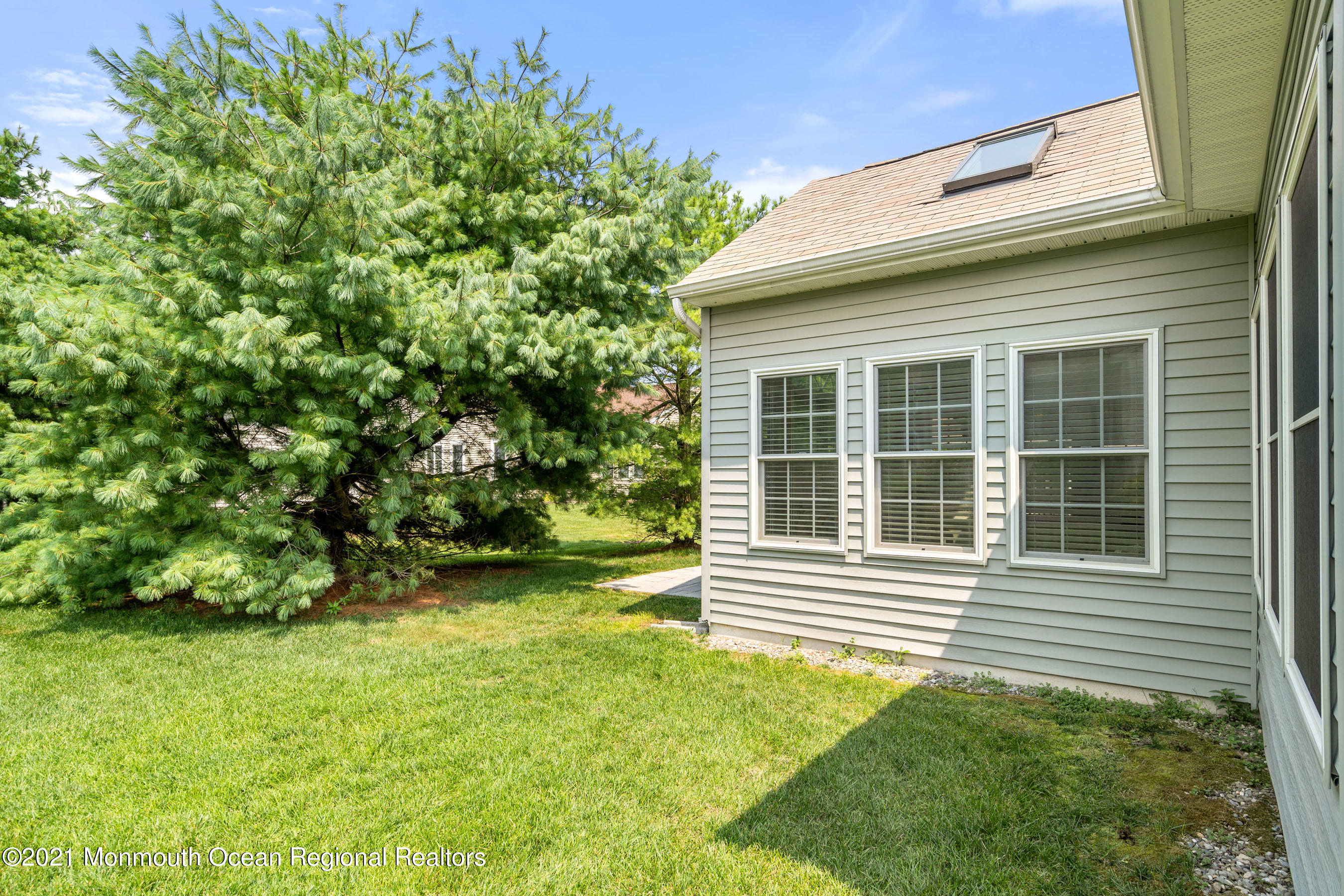 7 Millstone Way Waretown, NJ 08758 - Photo 26 of 45 a house view with a garden space