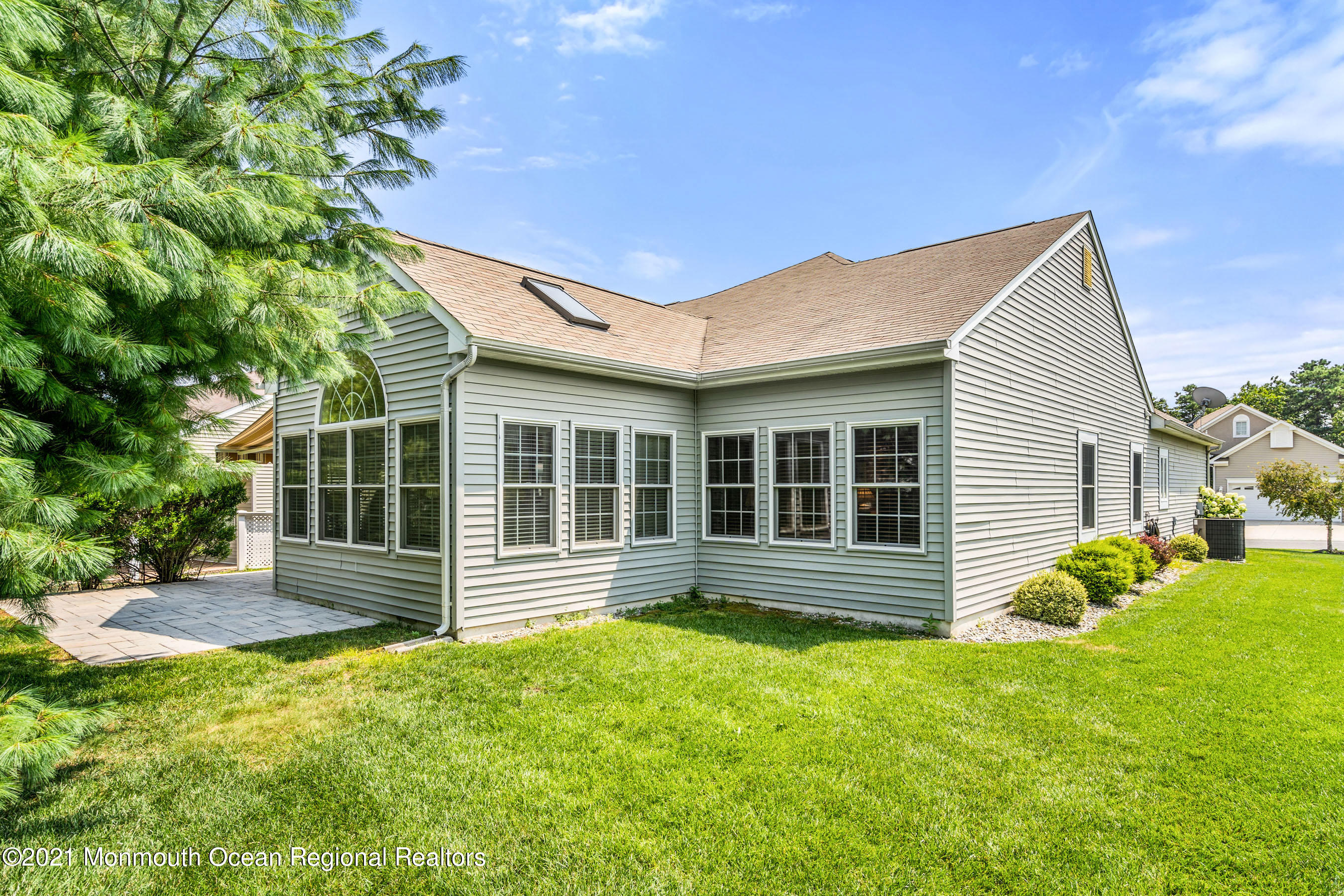 7 Millstone Way Waretown, NJ 08758 - Photo 27 of 45 a front view of a house with a yard
