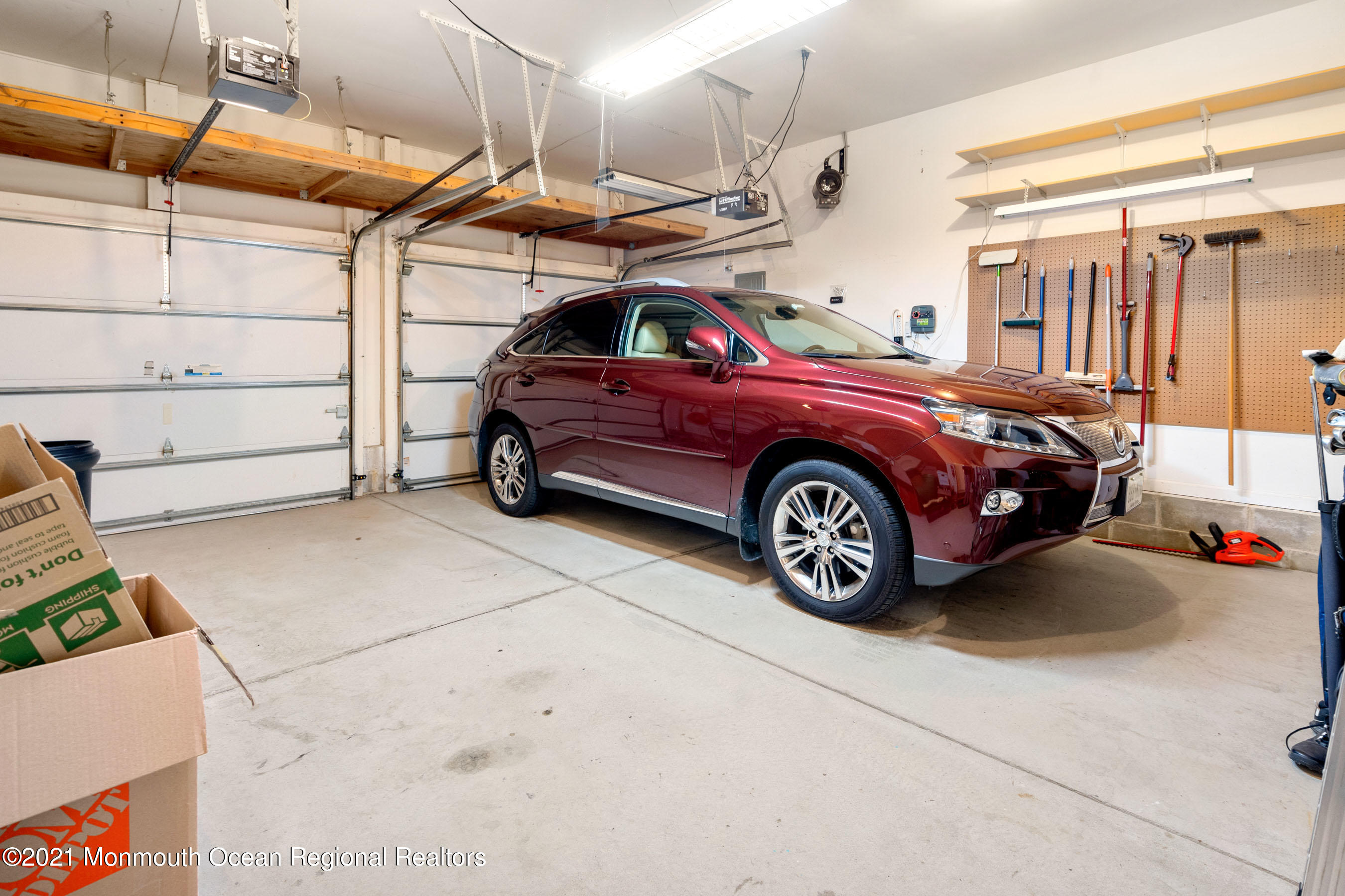 7 Millstone Way Waretown, NJ 08758 - Photo 28 of 45 a view of a car in garage