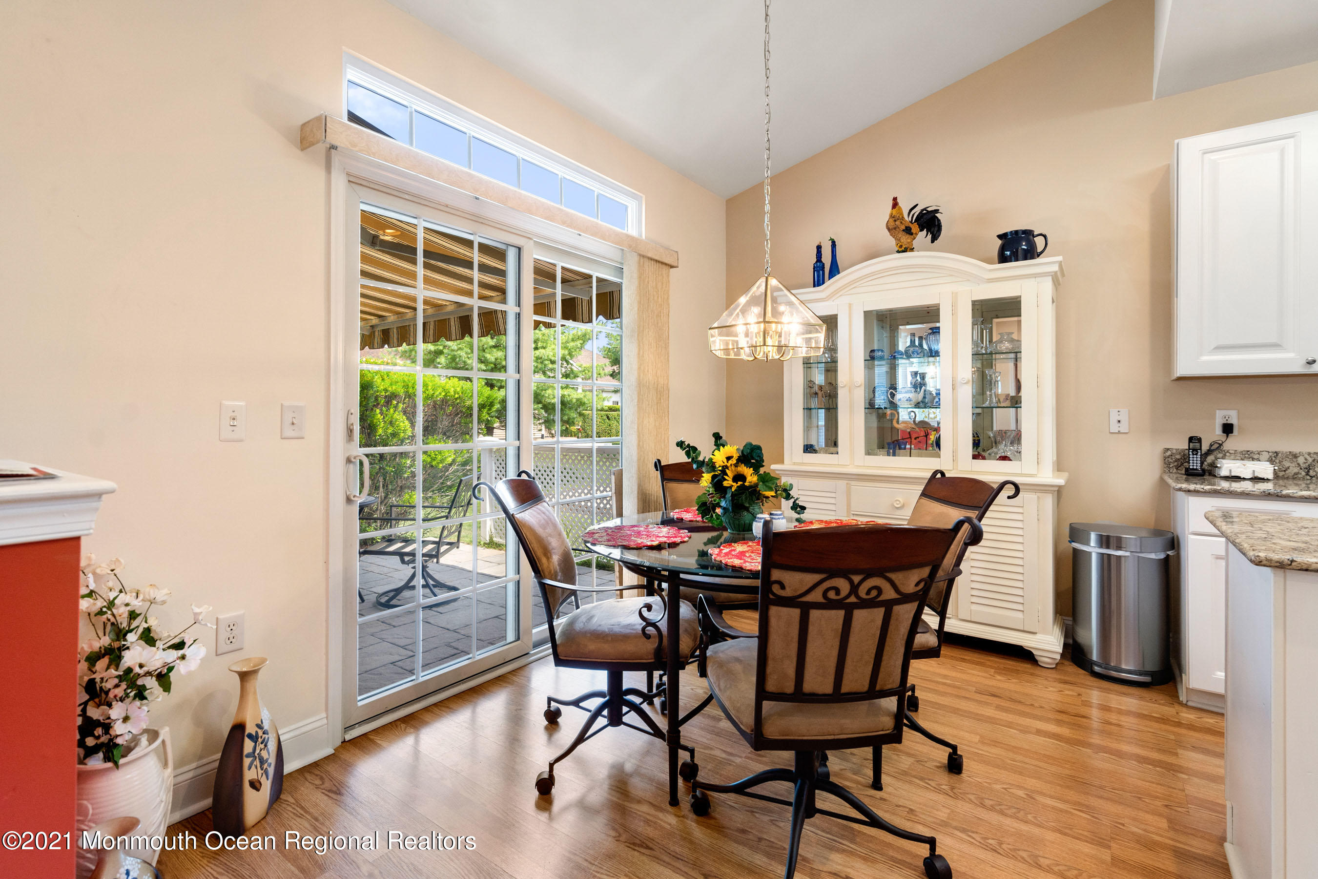 7 Millstone Way Waretown, NJ 08758 - Photo 10 of 45 a view of a dining room with furniture and wooden floor