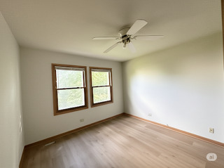 416 Fawn Lane Oswego, IL 60543 - Photo 12 of 13 a view of an empty room with a window