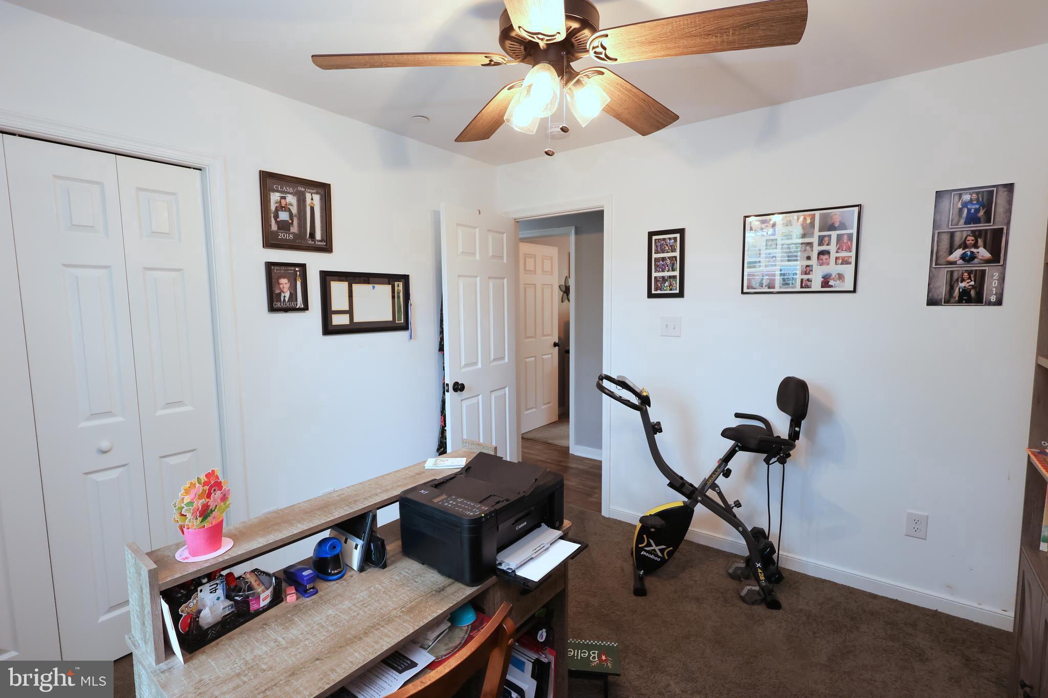 16919 Shaffer Road Sharpsburg, MD 21782 - Photo 27 of 58 a view of a workspace with furniture and a window
