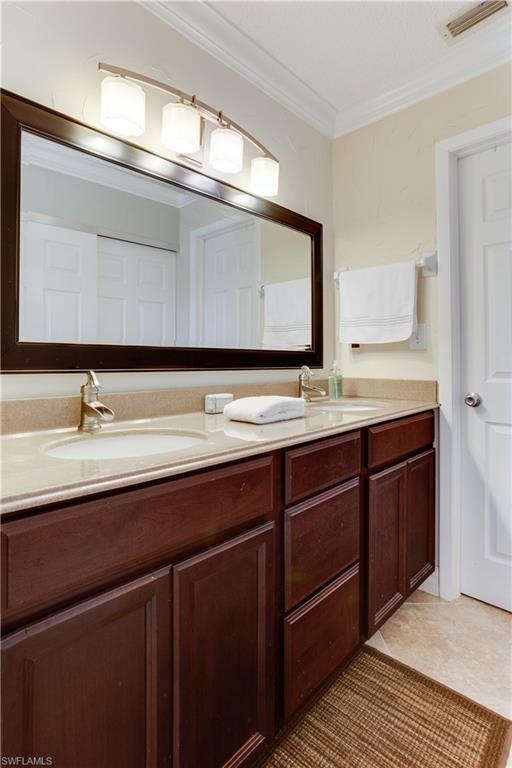195 Harrison Road, Unit 4 Naples, FL 34112 - Photo 16 of 31 Plenty of storage and nice new vanity, mirror & lights