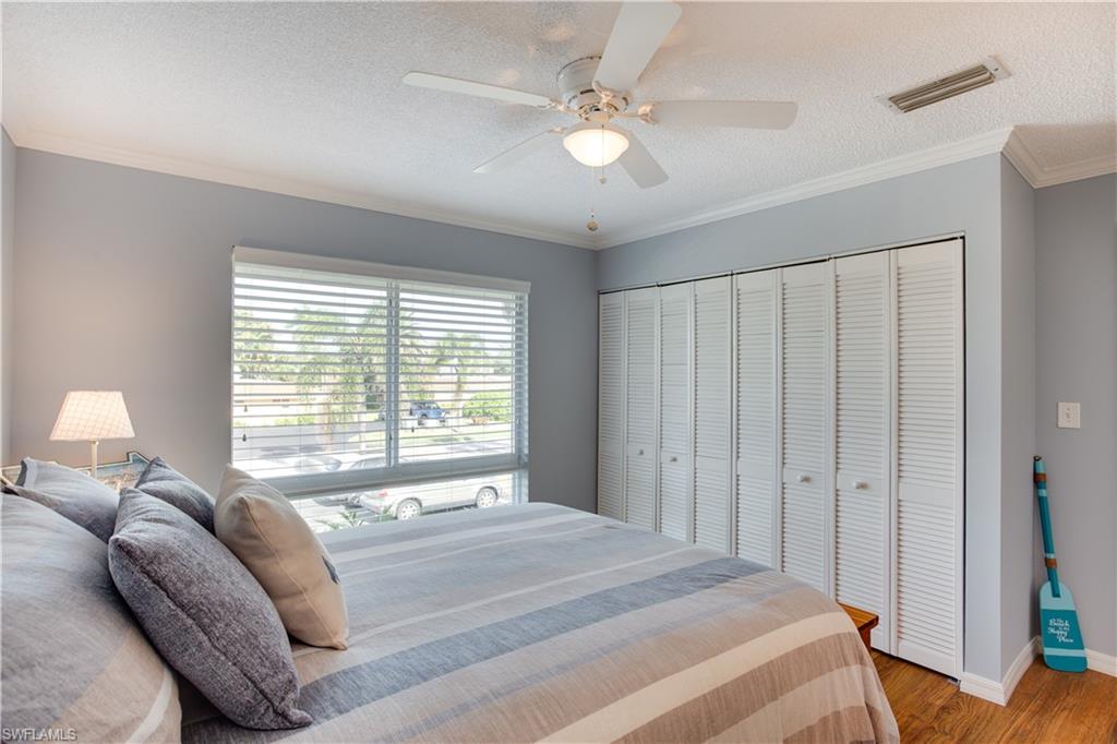 195 Harrison Road, Unit 4 Naples, FL 34112 - Photo 17 of 31 Serene guest bedroom with large closet!