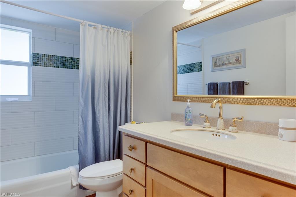 195 Harrison Road, Unit 4 Naples, FL 34112 - Photo 19 of 31 Updated guest bath; fresh & new!
