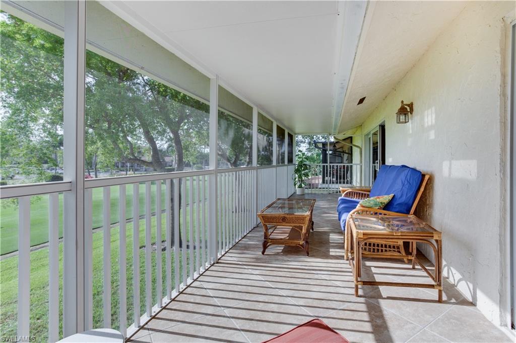 195 Harrison Road, Unit 4 Naples, FL 34112 - Photo 22 of 31 Even the lanai has been tiled!