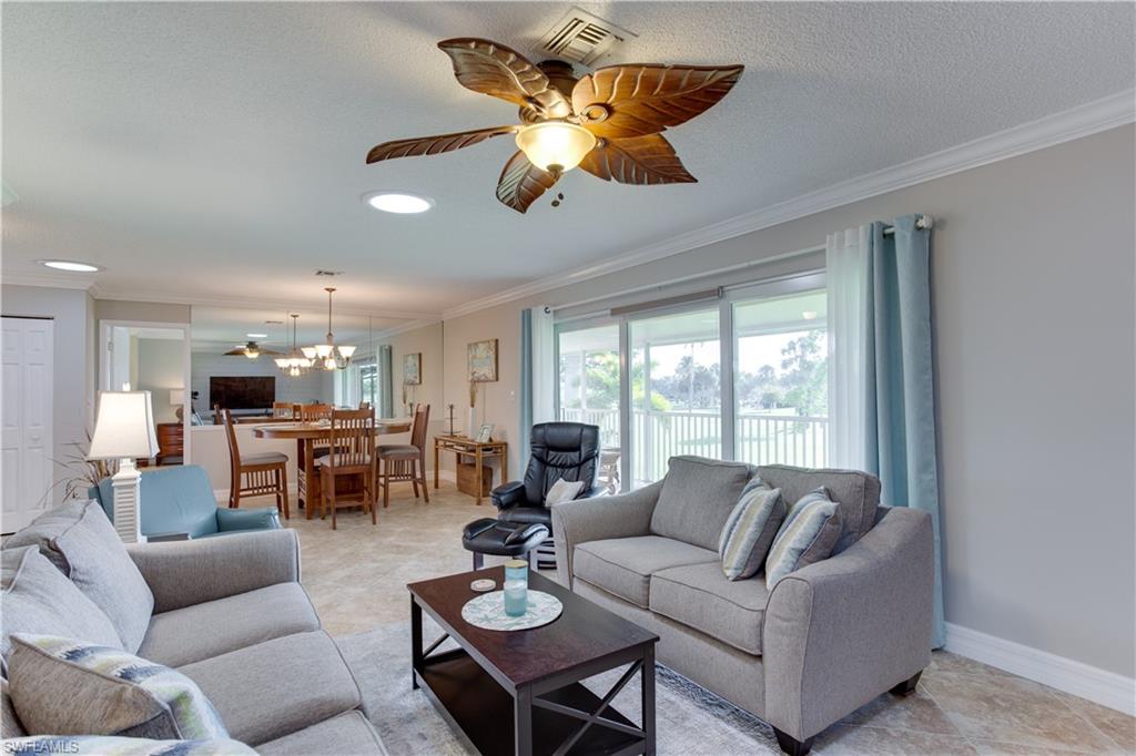 195 Harrison Road, Unit 4 Naples, FL 34112 - Photo 3 of 31 Light & bright comfortable living room